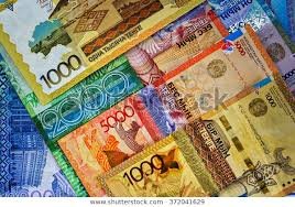 Qazaxıstanda dollar rekord vurdu - Təngə tab gətirmədi