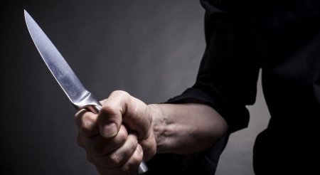 Azərbaycanda kişi qonşusunun qulağını kəsdi
